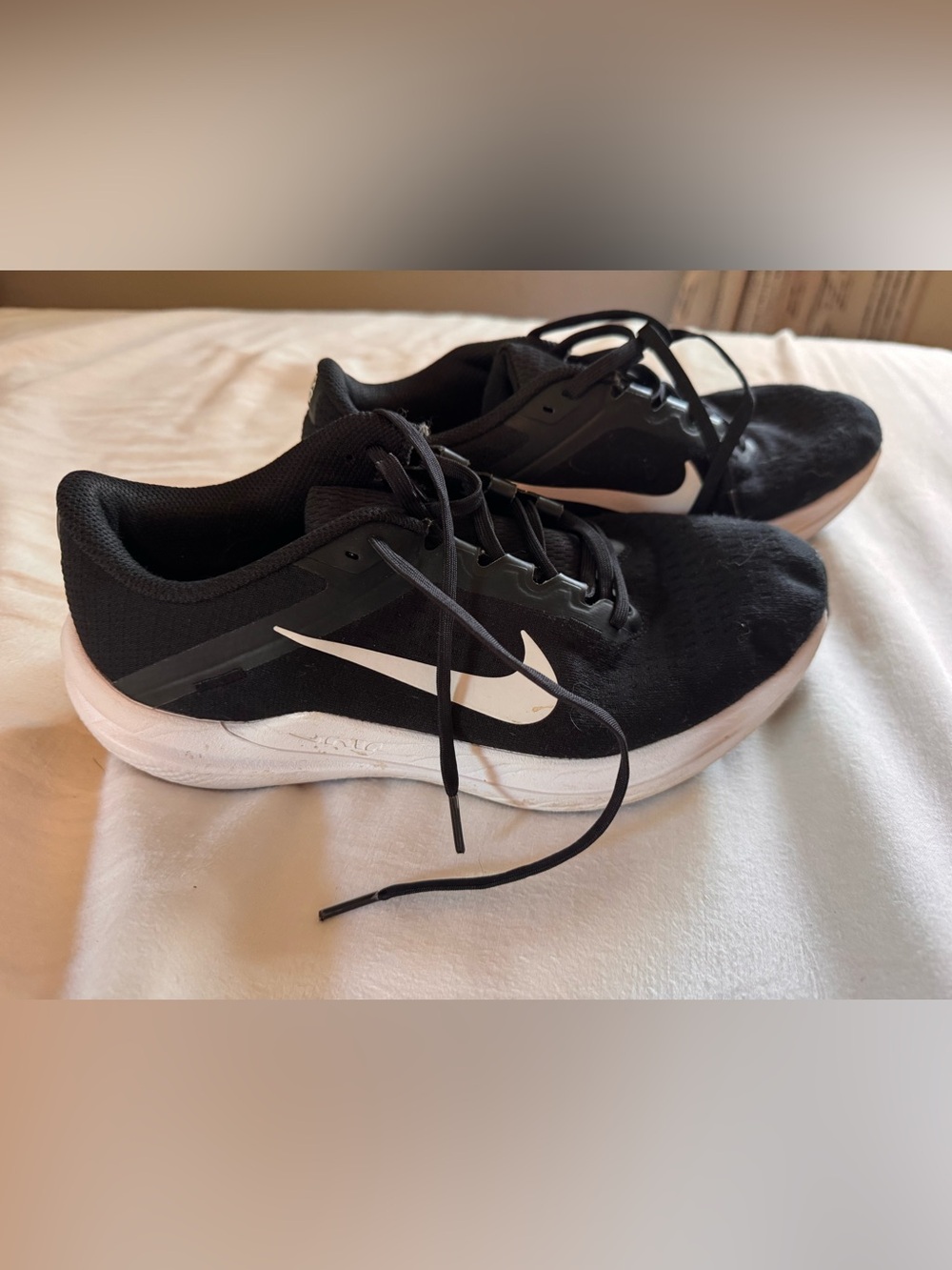 Nike Women’s Black Running Shoes with White Swoosh